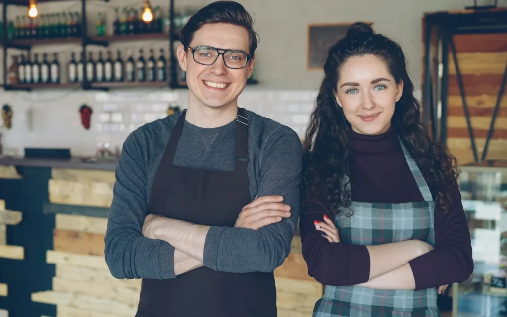 Small cafe owners, representing local SEO for small businesses