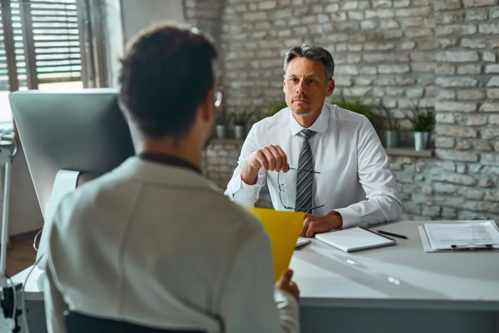 HR recruiter interviewing a candidate for a small business