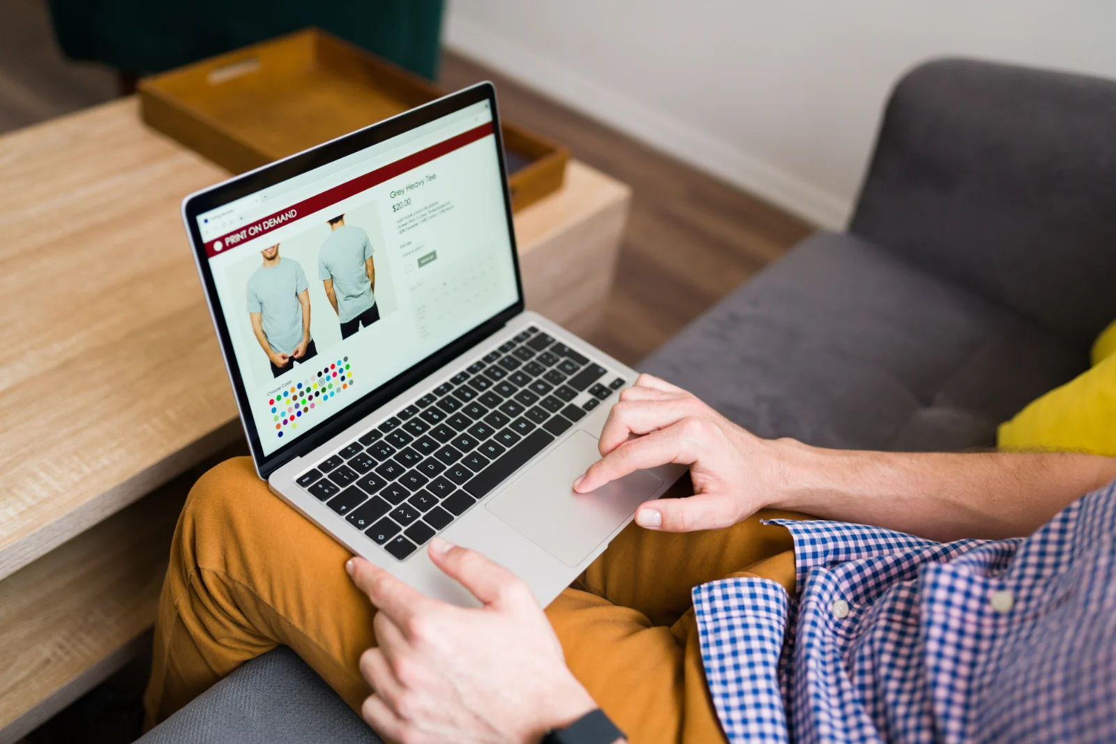 Customer shopping online on an e-commerce store from a laptop