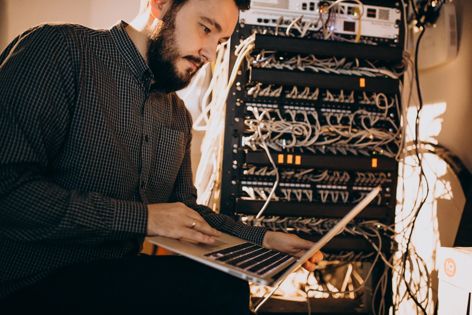 IT technician performing website and server maintenance