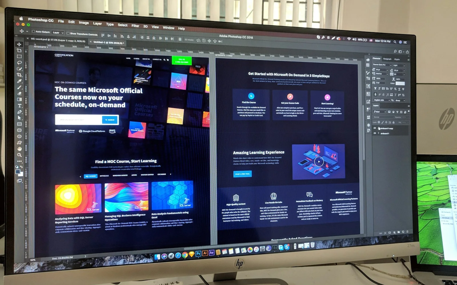 Designer monitor showing a website redesign in progress