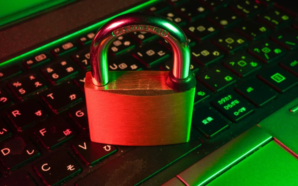 Red padlock on a keyboard representing WordPress website security
